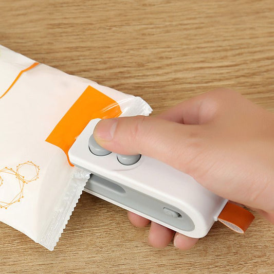 ✨ Máquina Mini Portátil Recarregável 2 em 1: Seladora e Cortadora de Sacolas ✨